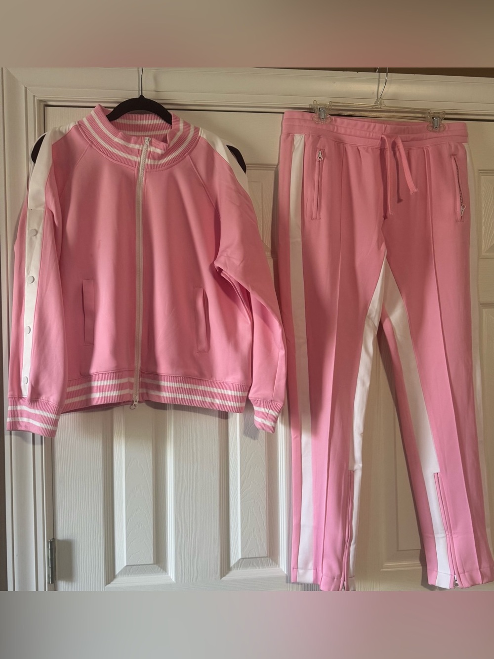 Ladies Pink Two-Piece Jogger Set with White Stripe and cut-out shoulders
